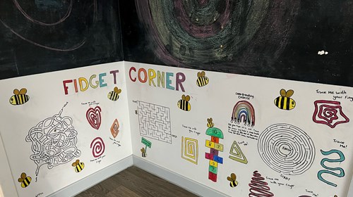 Mural on Poplar Ward with fidget activities and mazes